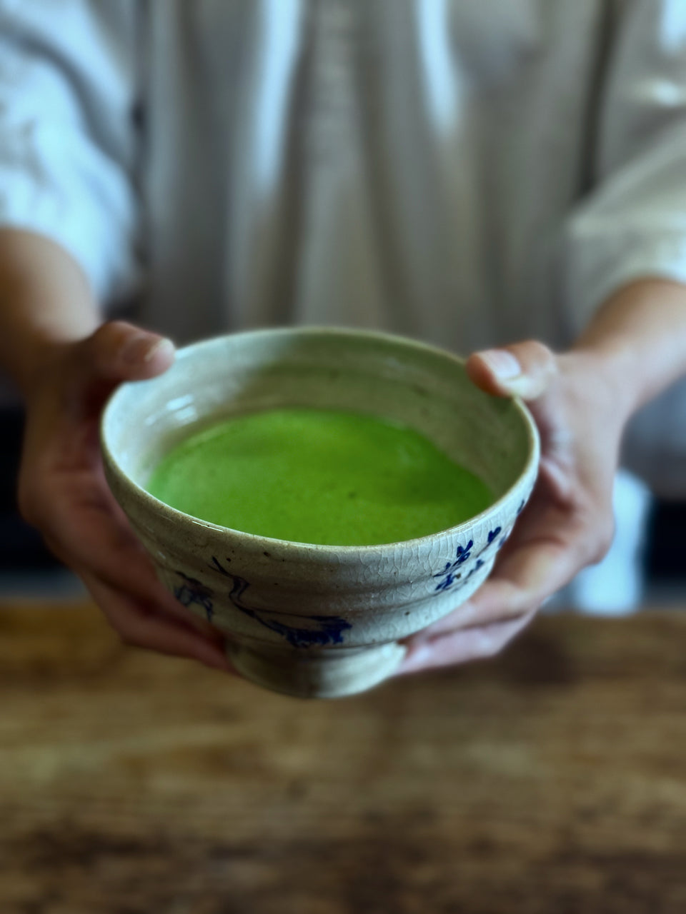 Fresh milled matcha in antique tea bowl